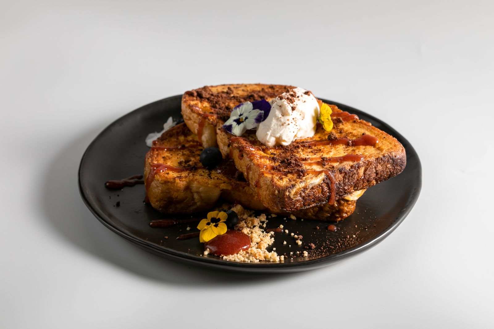 French toast but not Really with chantilly cream and berries